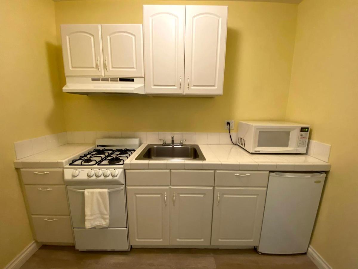 Quarto Executivo Queen com 2 Camas Queen-size e Cozinha