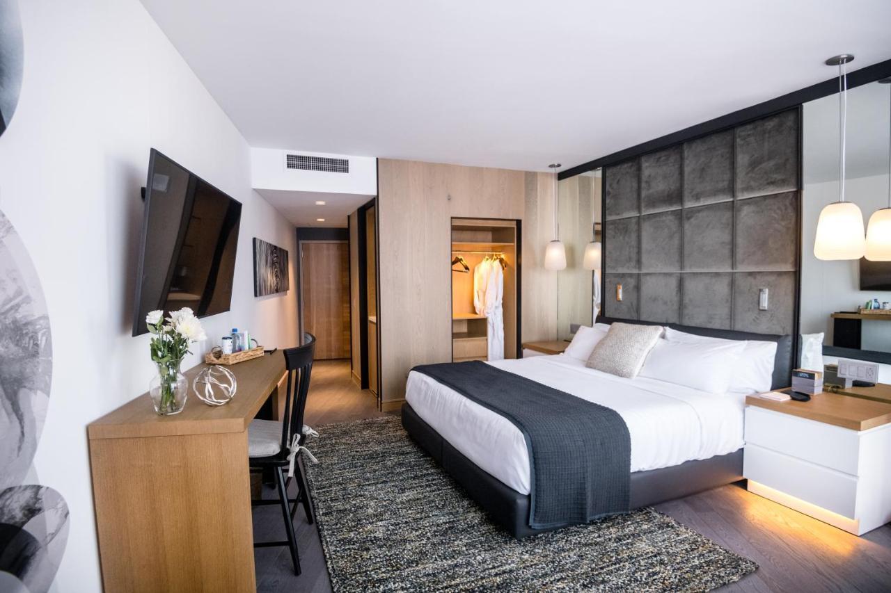 Suite met Kingsize Bed op de Skyline Club Verdieping