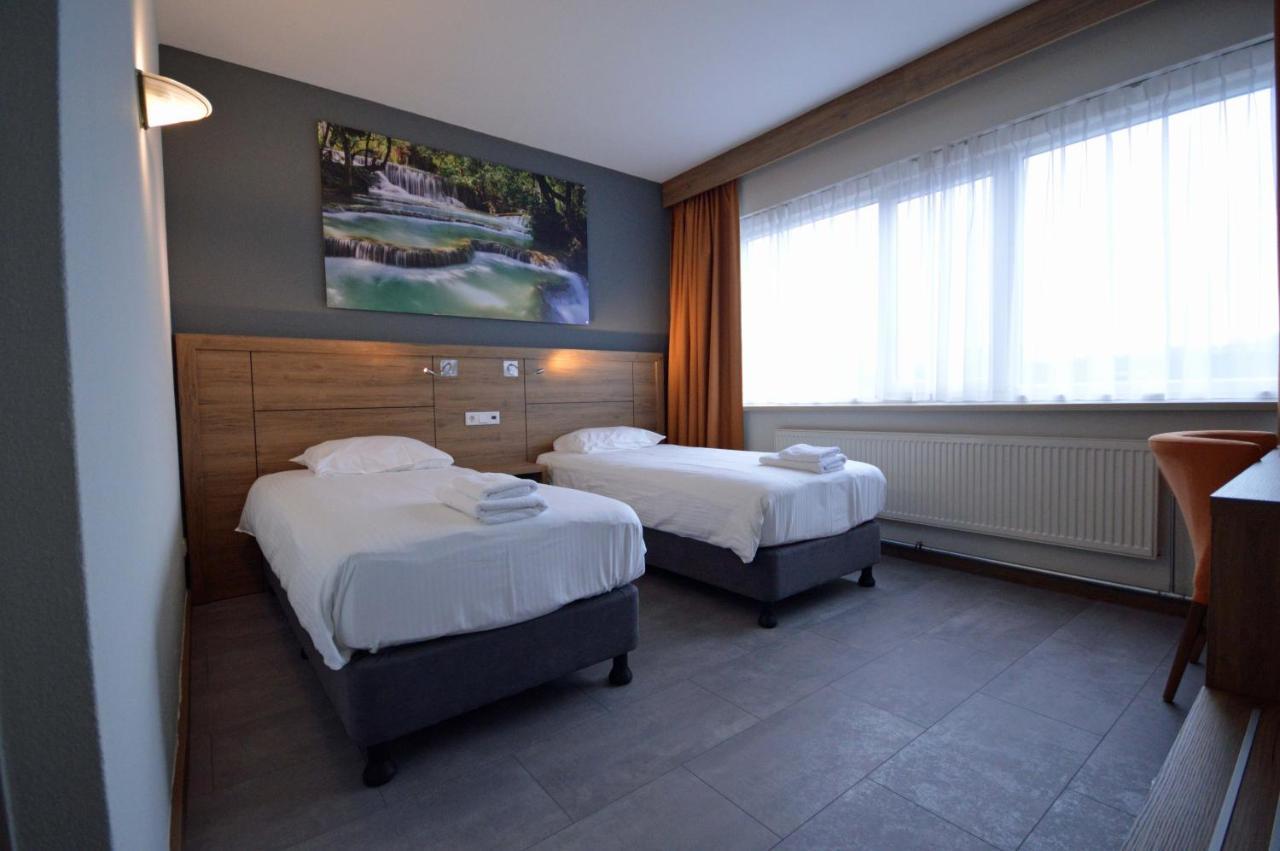 Tweepersoonskamer met 2 Aparte Bedden