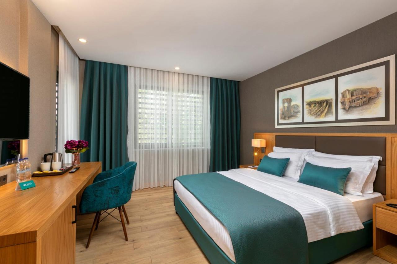Deluxe tweepersoonskamer met balkon en uitzicht op zee