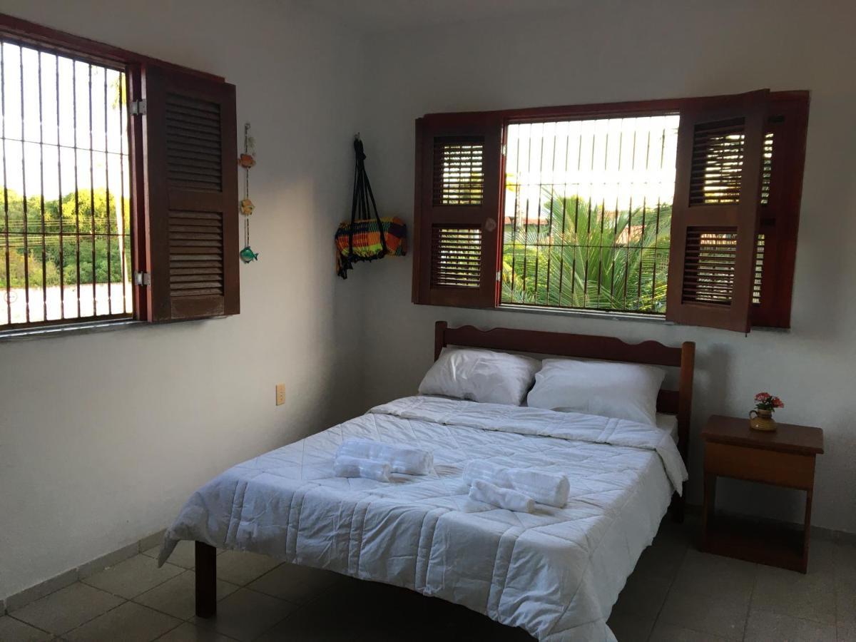 Quarto Triplo com Banheiro Privativo