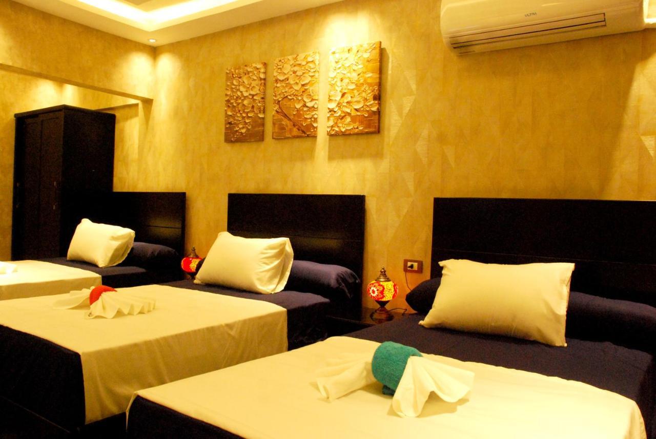 Chambre Triple avec Salle de Bains Privative
