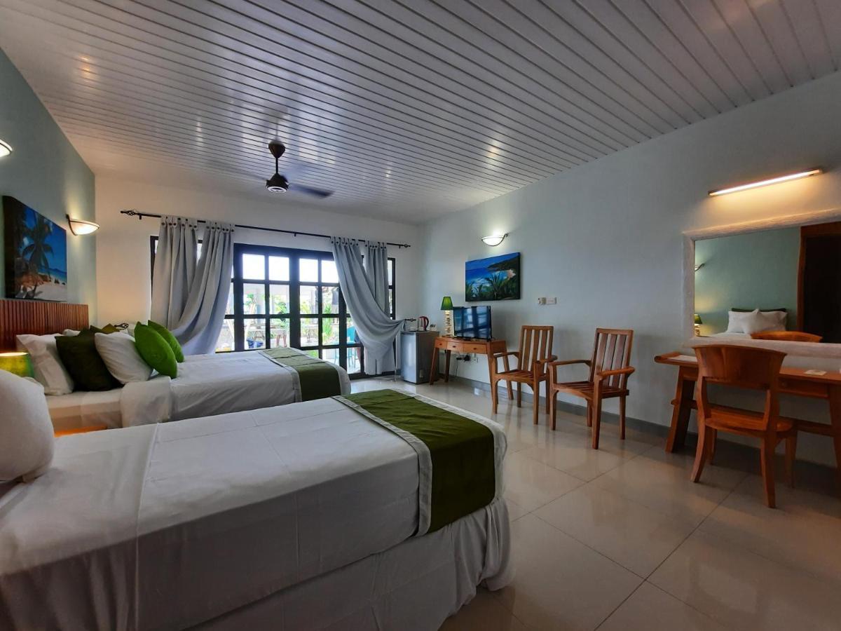 Chambre Triple avec Terrasse