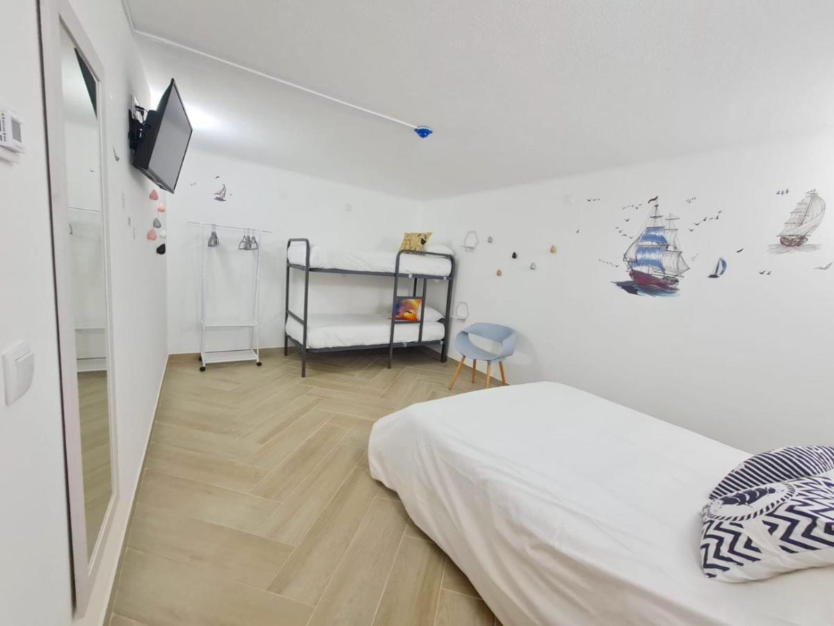 Quarto Familiar com Casa de Banho Partilhada