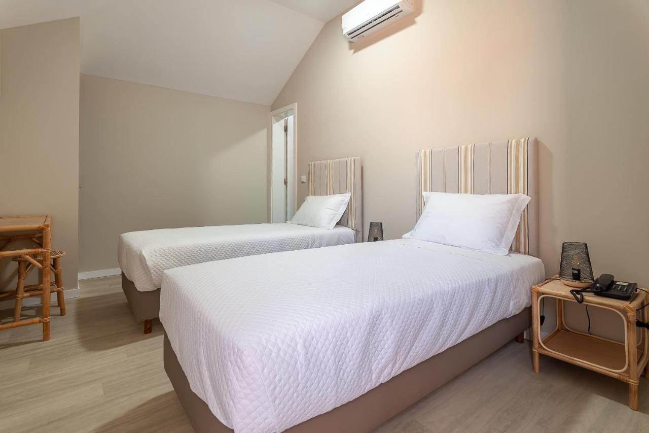 Quarto Twin com Chuveiro