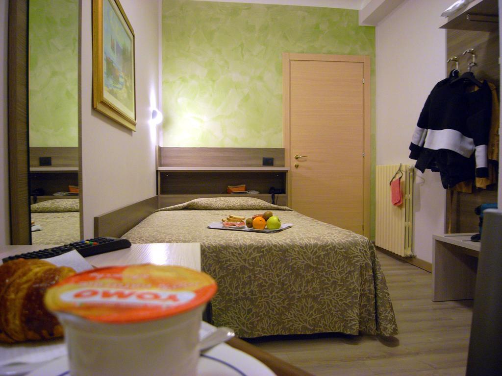 Habitación individual con aseo compartido