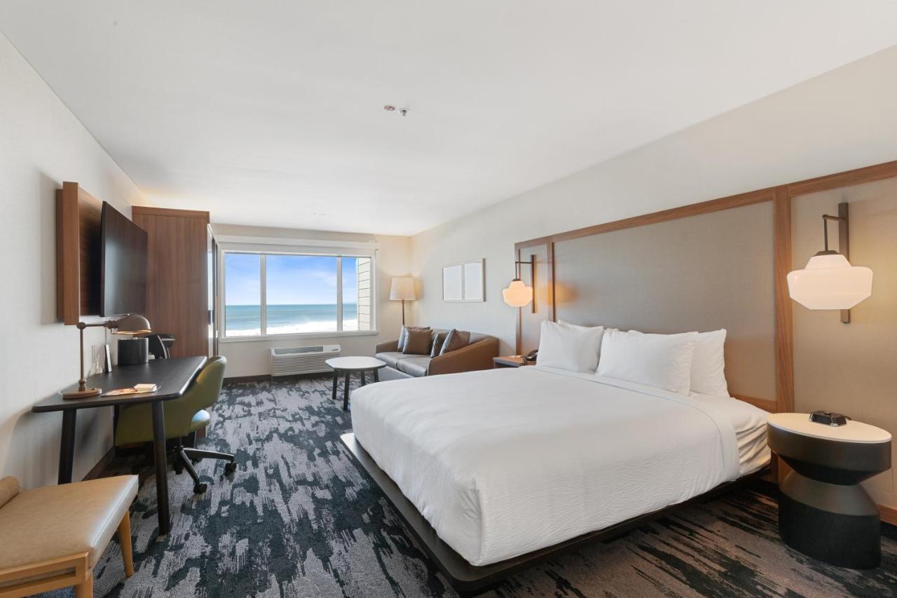 King Suite with Partial Ocean View and Sofa Bed
