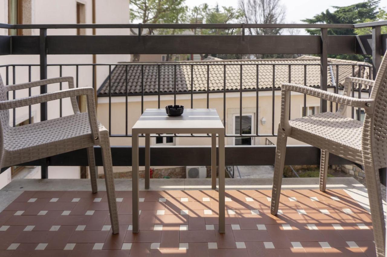 Camera Matrimoniale/Doppia con Letti Singoli con Balcone