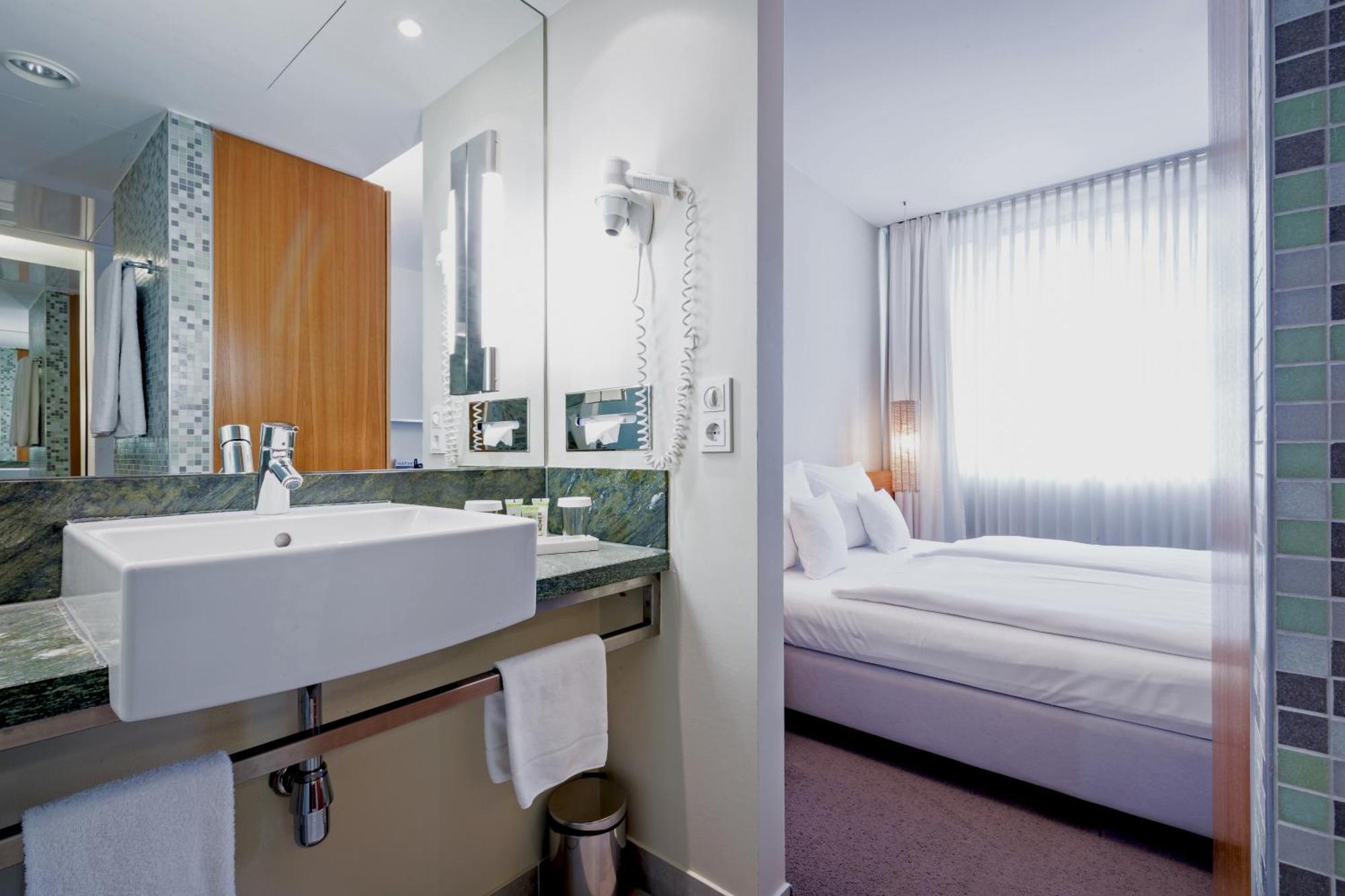 Kamer met Queensize Bed en Balkon