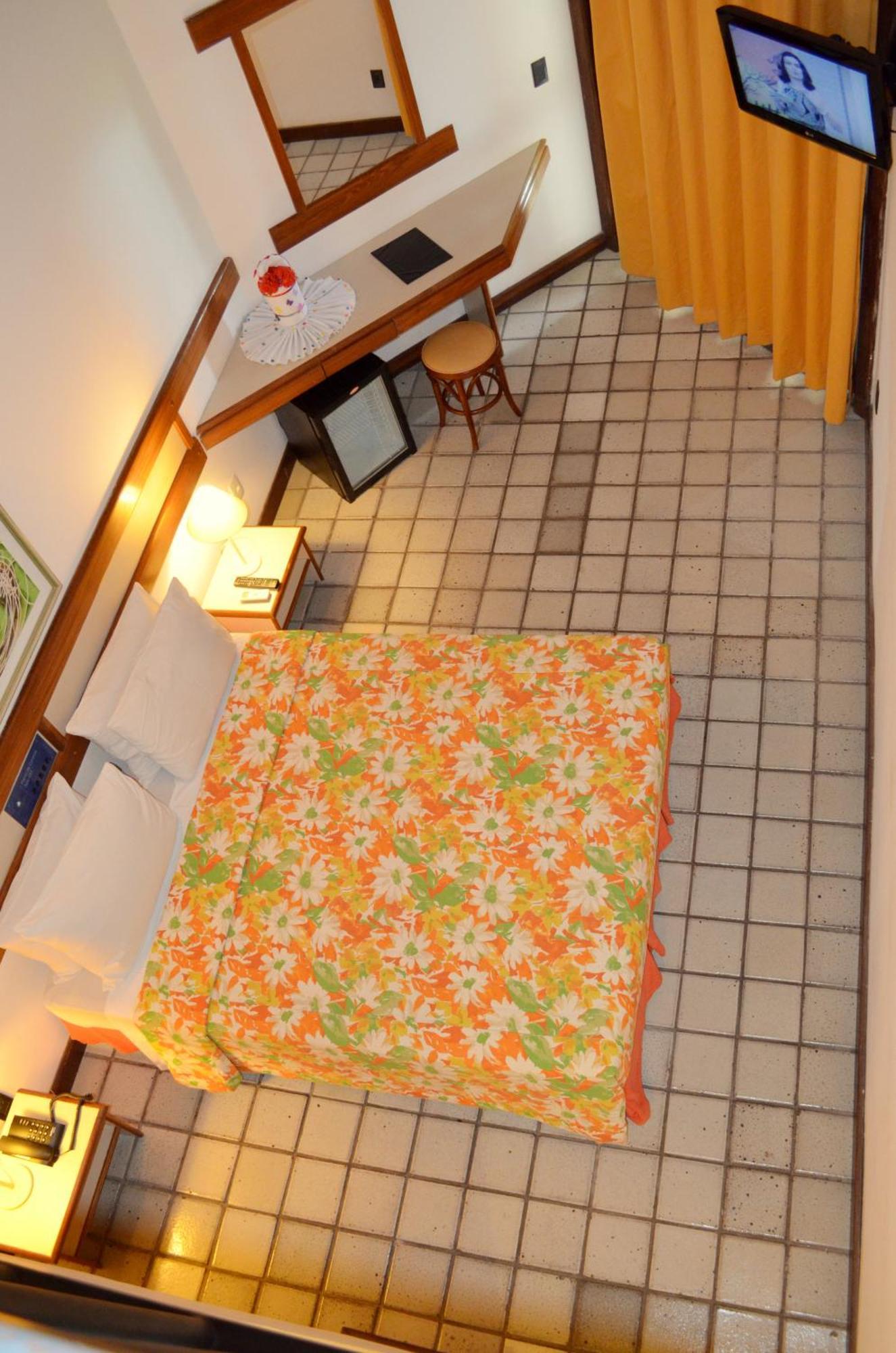 Quarto Quádruplo Premium