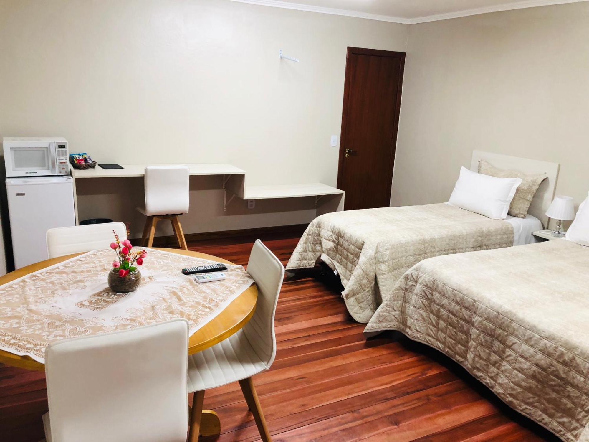 Quarto Quádruplo Premium