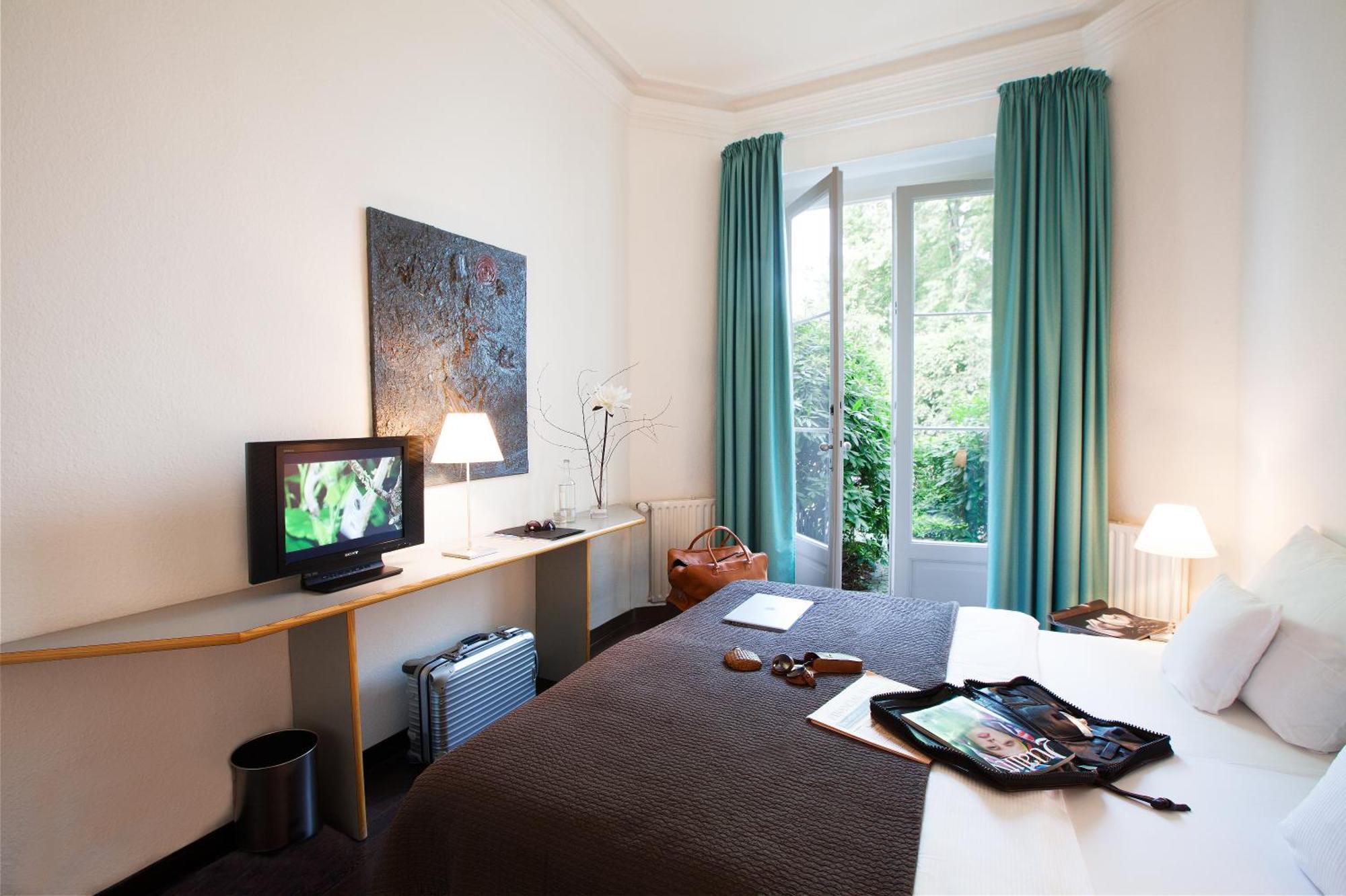 Habitación con patio jardín