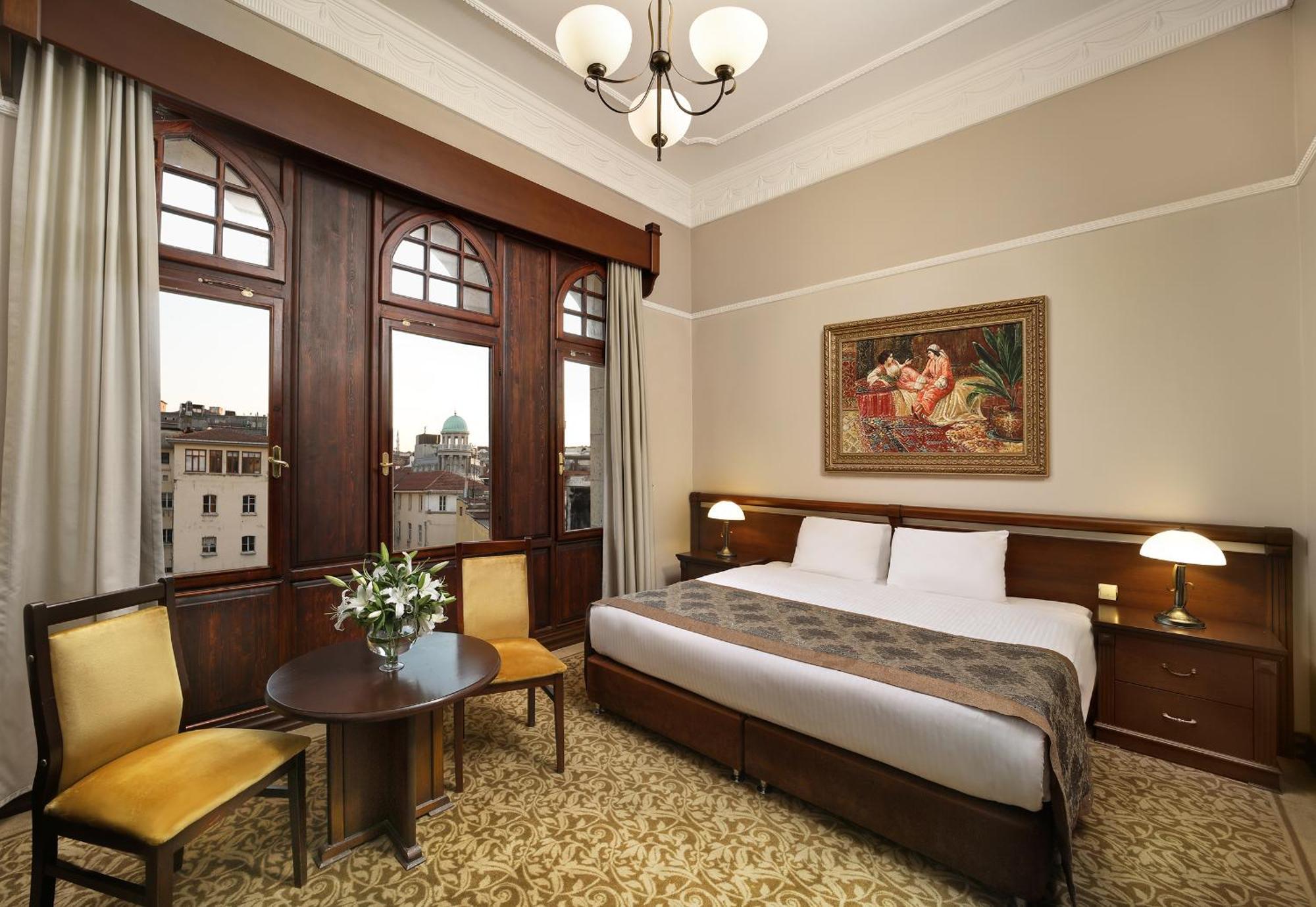 Deluxe Kamer met Kingsize Bed of 2 Aparte Bedden en Uitzicht op de Stad