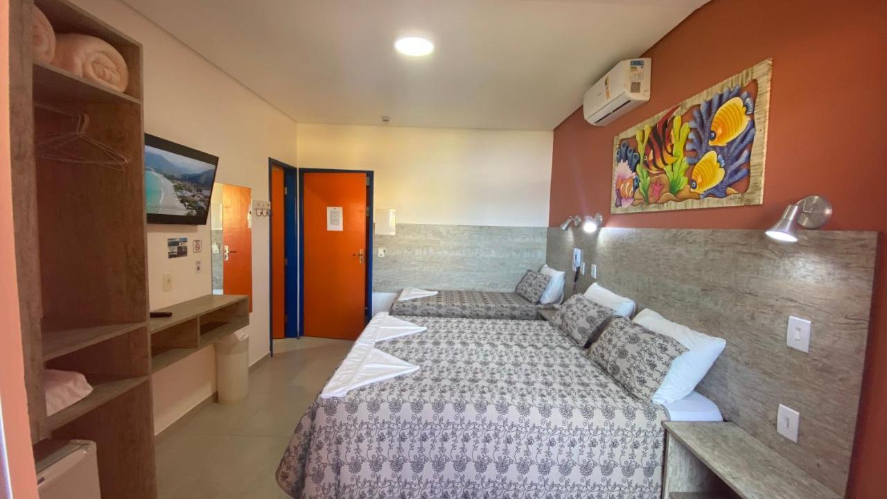 Quarto Quádruplo com Vista Parcial para o Mar