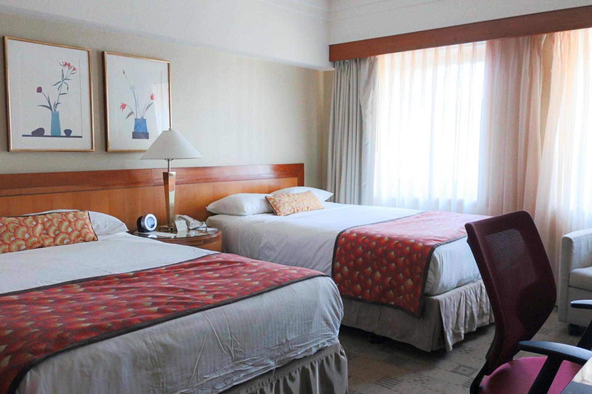 Quarto Duplo Superior com 2 Camas de Casal