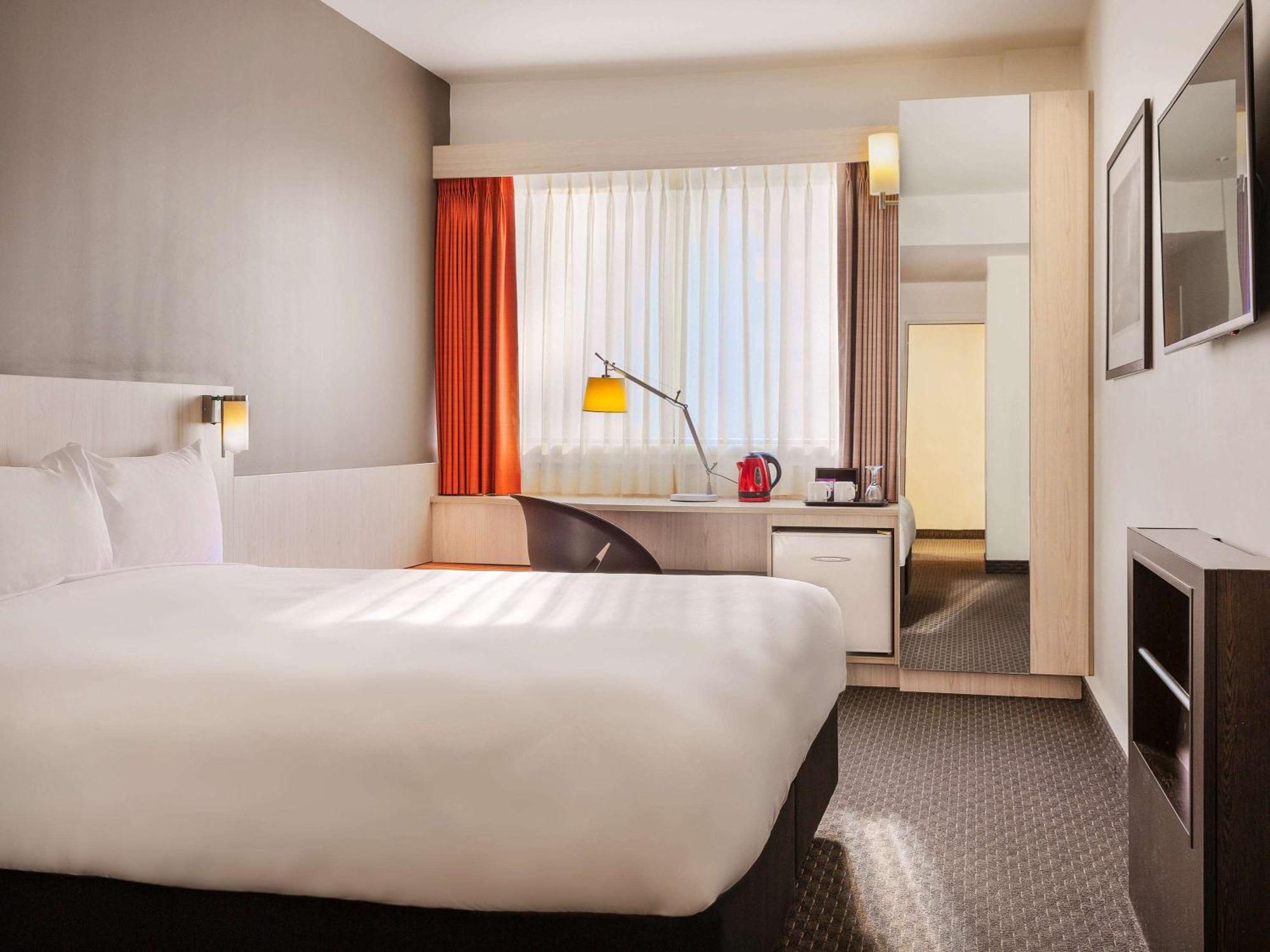 Zimmer mit Queensize-Bett