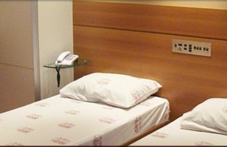 Quarto com 2 Camas de Solteiro