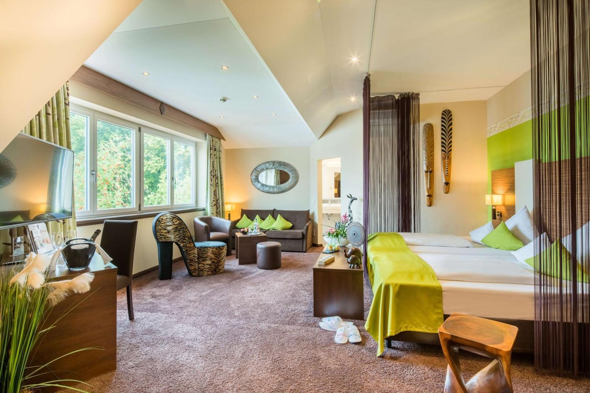Deluxe Suite mit Kingsize-Bett und Whirlpool