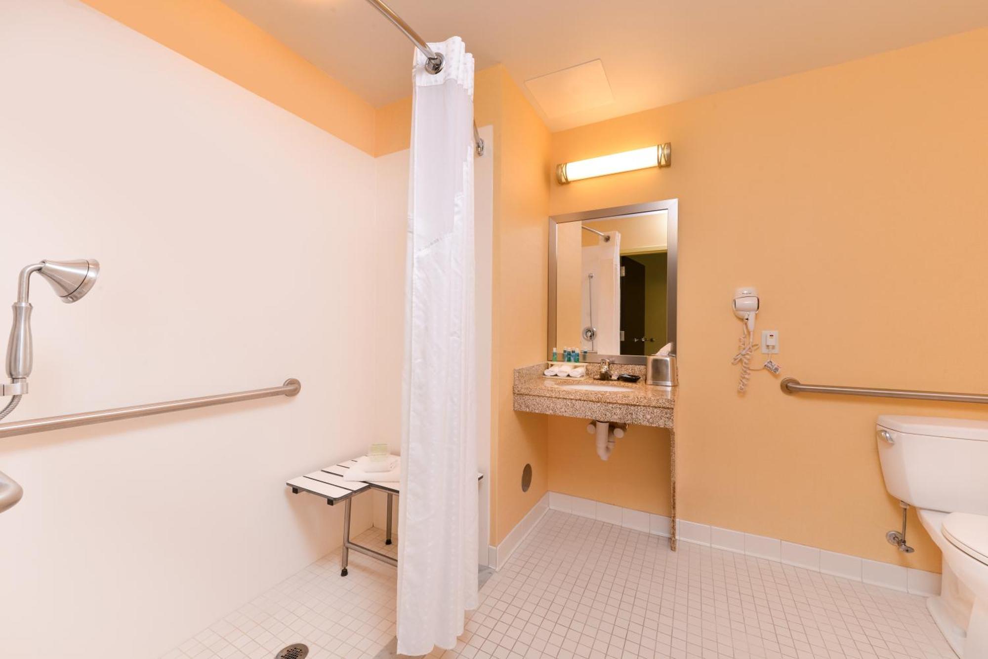 Queen Room with Two Queen Beds Hearing Accessible with Roll-In Shower - Non-Smoking