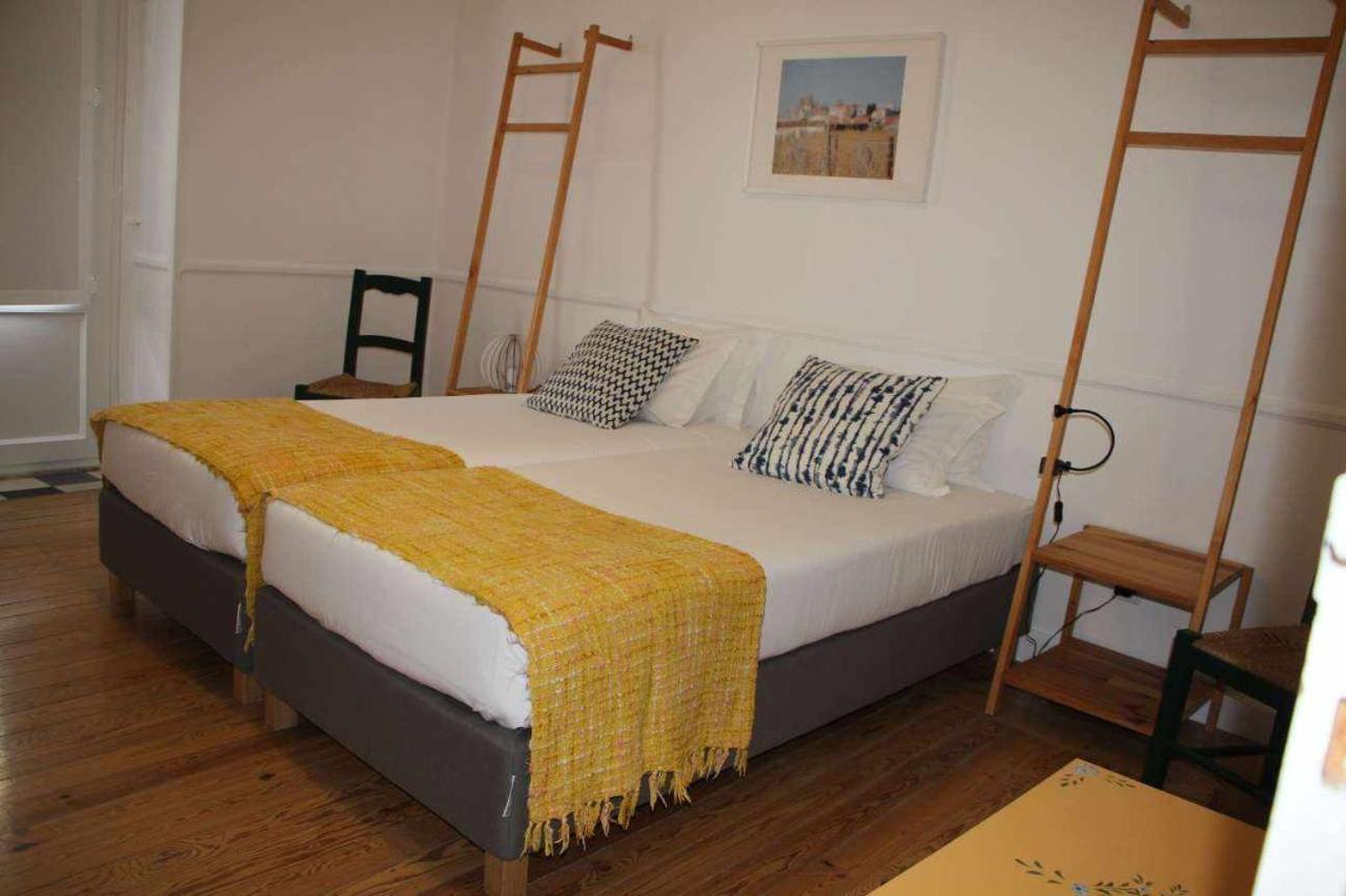 Quarto Twin com Casa de Banho Partilhada