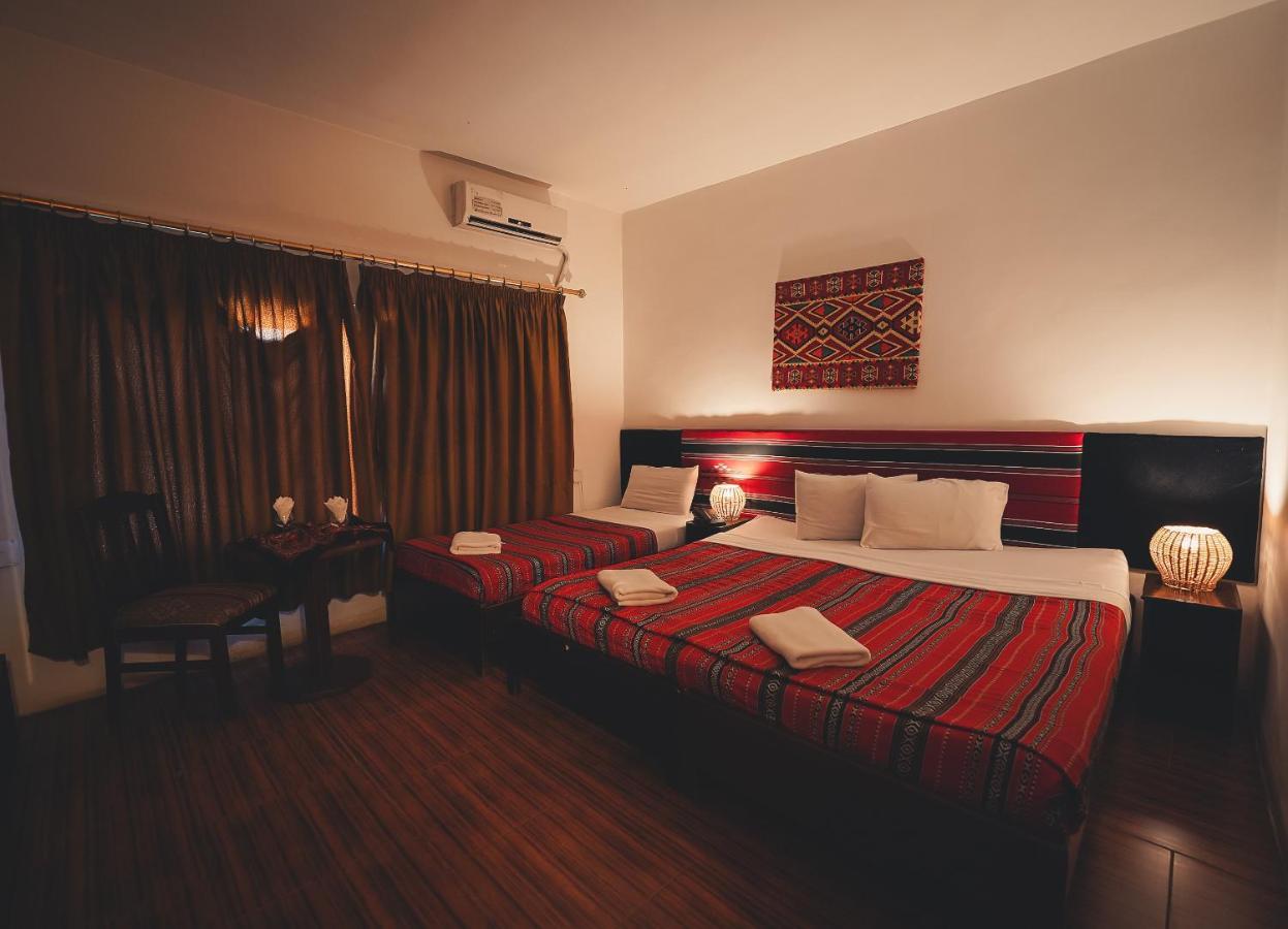 Chambre Triple - Vue sur Ville