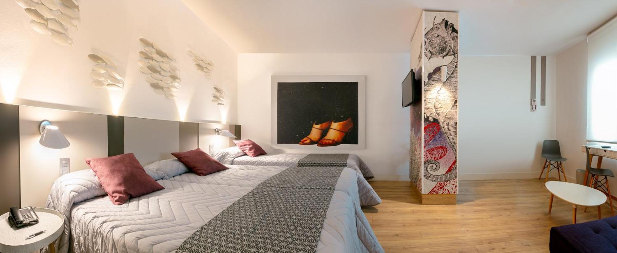 Habitación Familiar Básica (2 adultos + 1 niño)