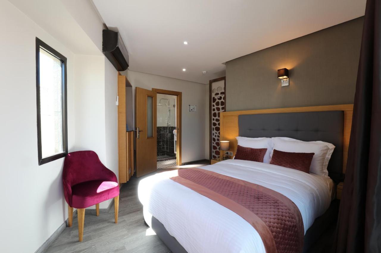 Quarto com Cama Queen-Size e Varanda