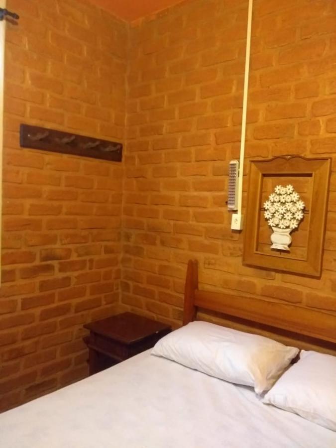 Quarto Quádruplo com Vista da Montanha