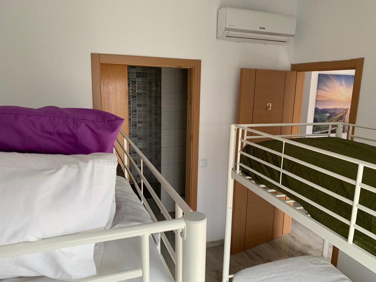 Cama Individual en habitación compartida femenina