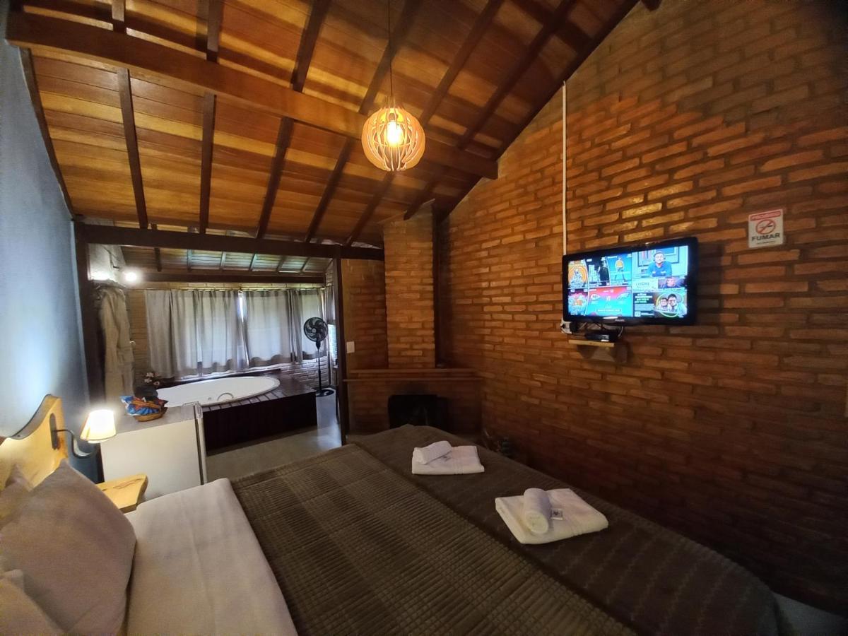 Chalé de Luxo com Banheira de Hidromassagem.