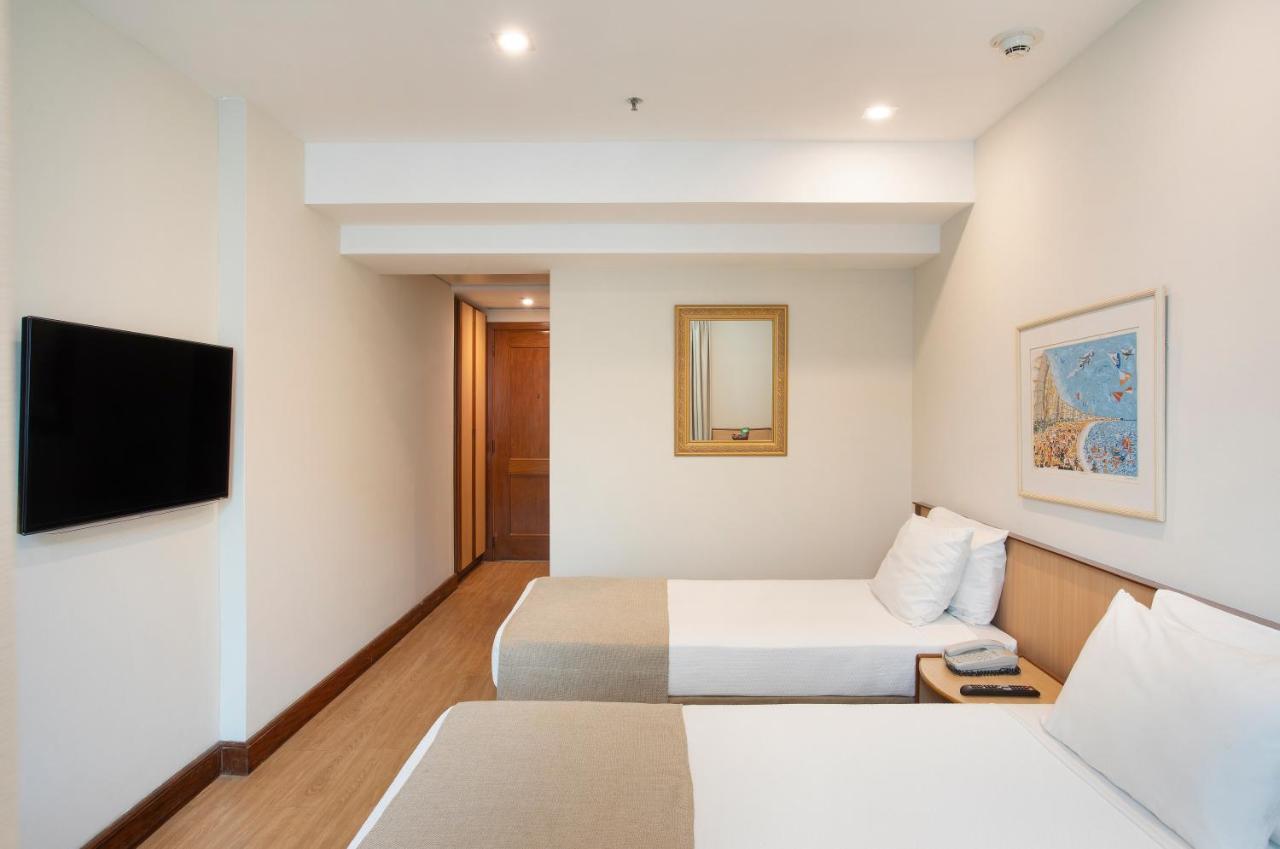 Quarto Twin Executivo Superior com Vista Cidade