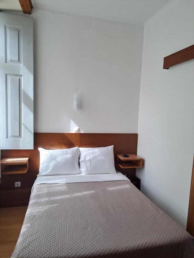 Quarto Individual com Casa de Banho
