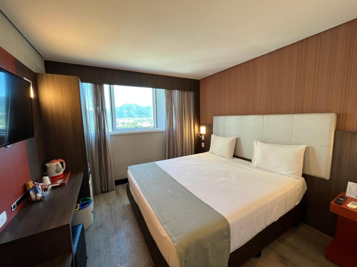 Quarto Superior com Cama Queen-size