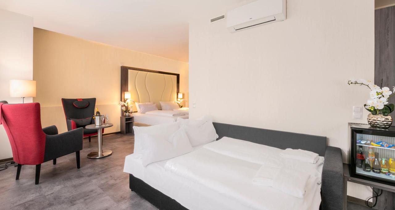 Junior Suite met 1 Slaapkamer, 1 Tweepersoonsbed en 1 Eenpersoonsbed - Slaapbank