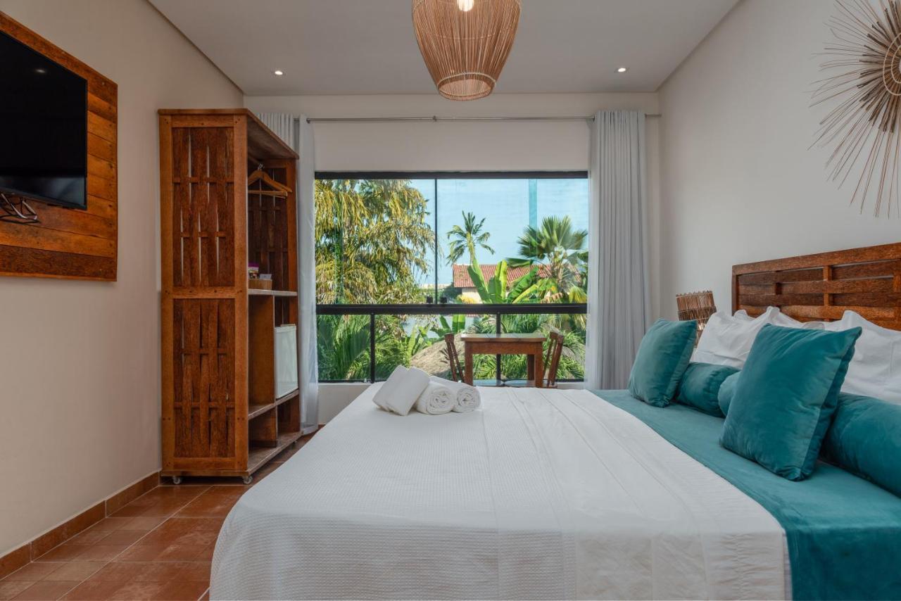 Suíte com Vista do Jardim