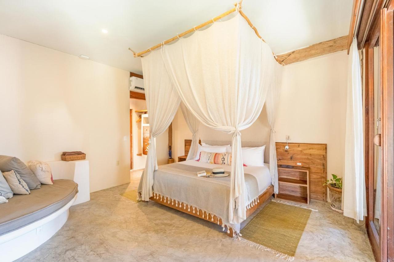 Suite Junior con vistas al jardín - Nivel playa