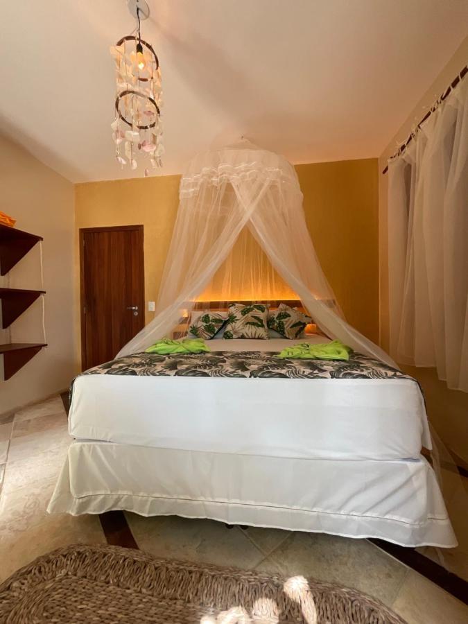 Quarto Quádruplo com Vista do Mar.