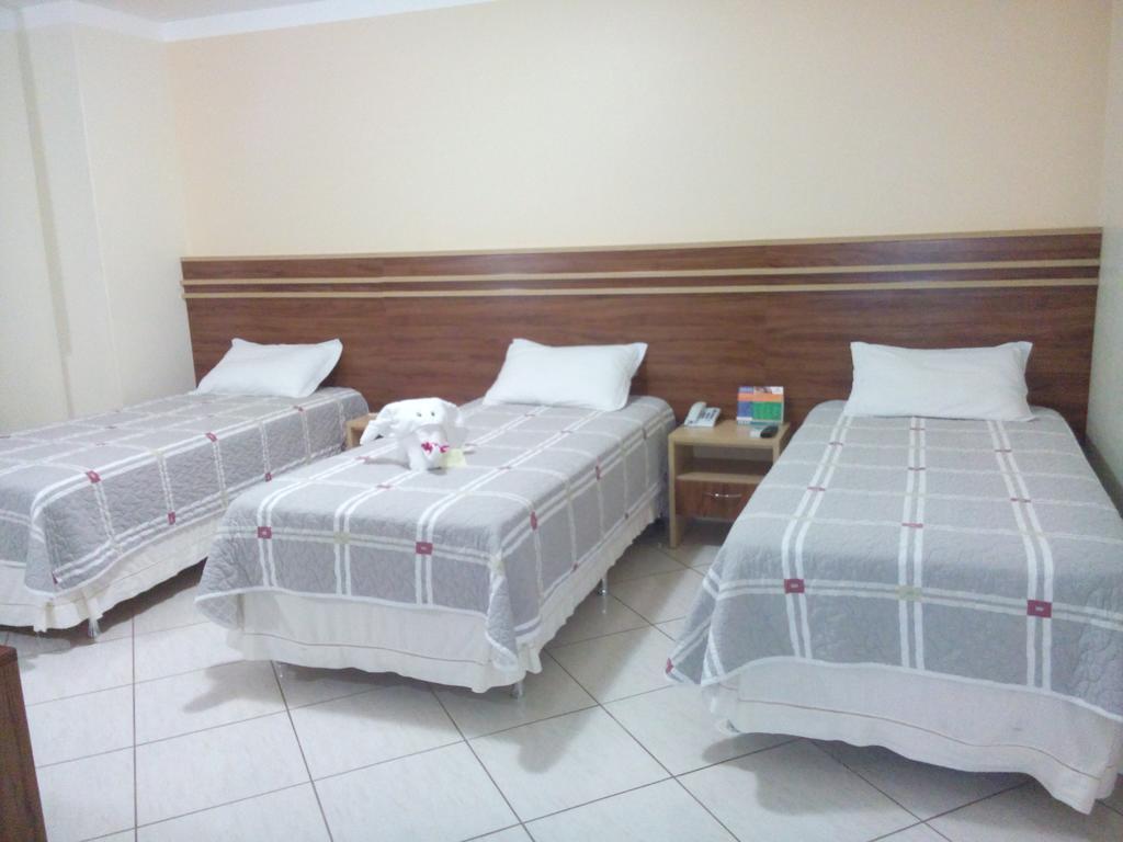 Quarto Triplo Luxo - 3 Camas de Solteiro