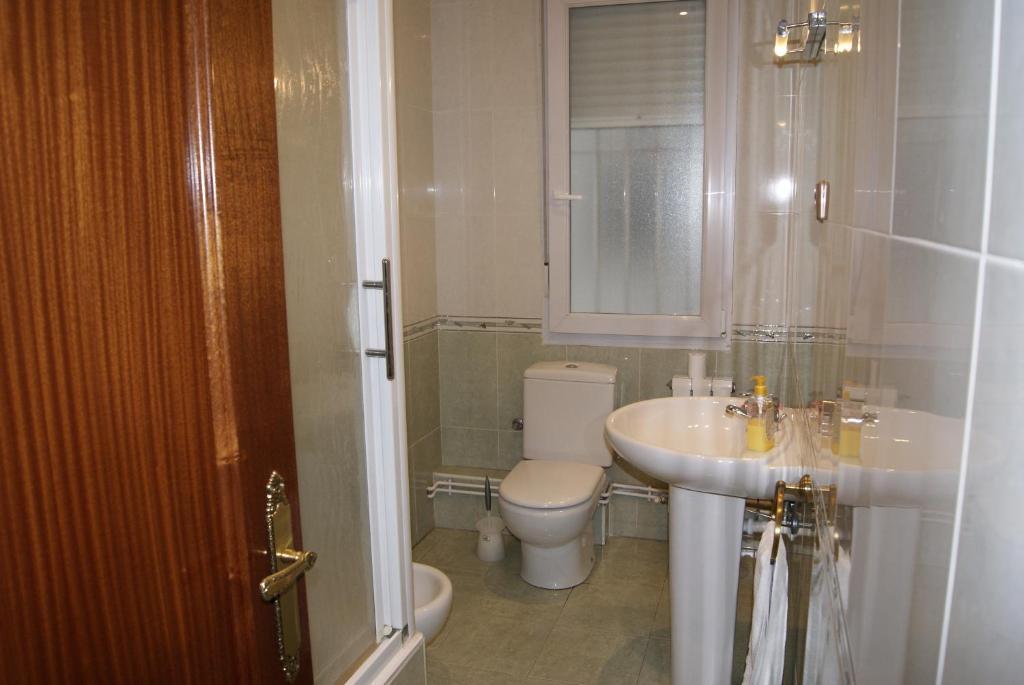 Tweepersoonskamer met 1 of 2 Bedden en Gedeelde Badkamer
