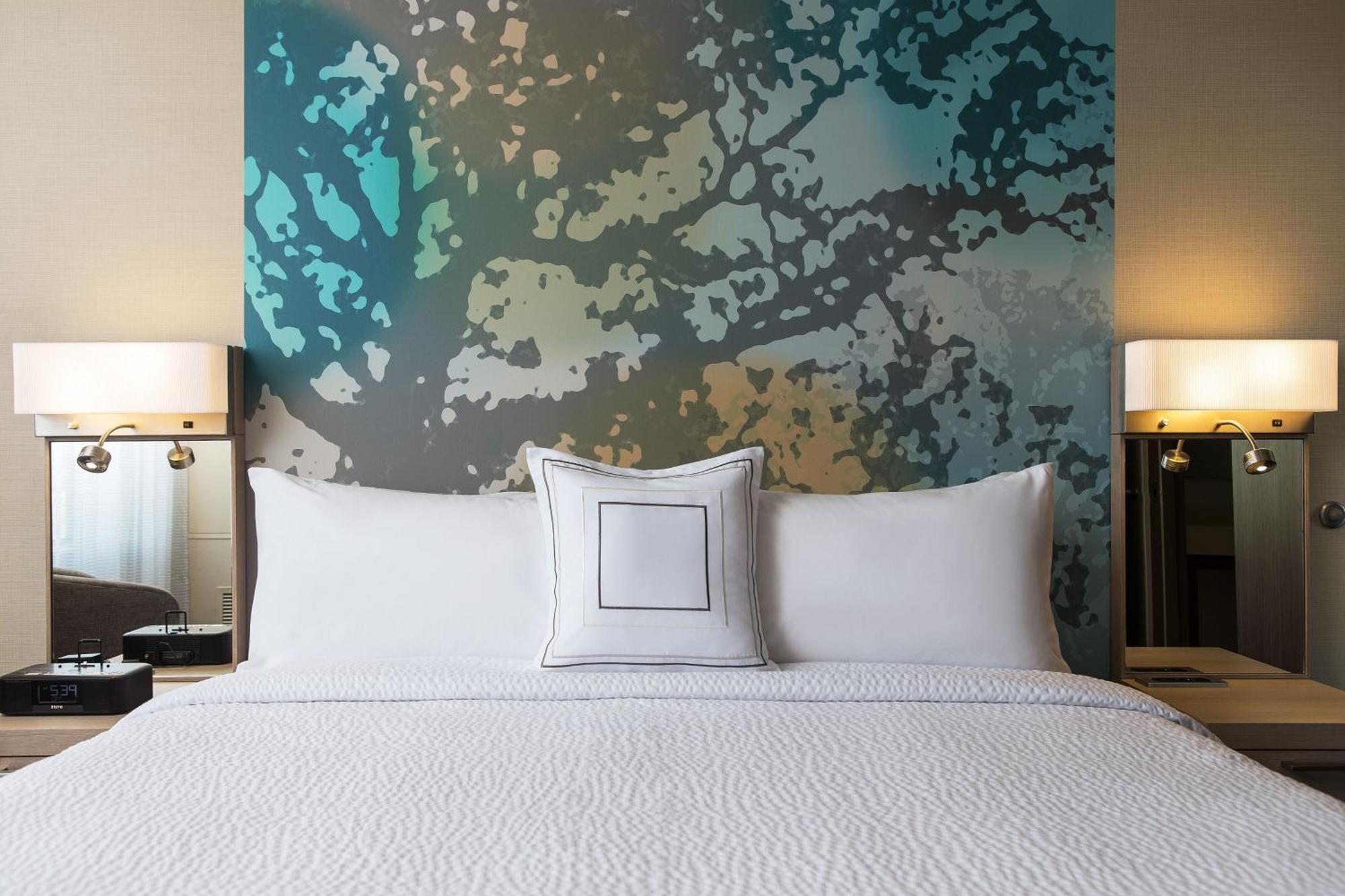 Deluxe Queen Room with Two Queen Beds - Pool View