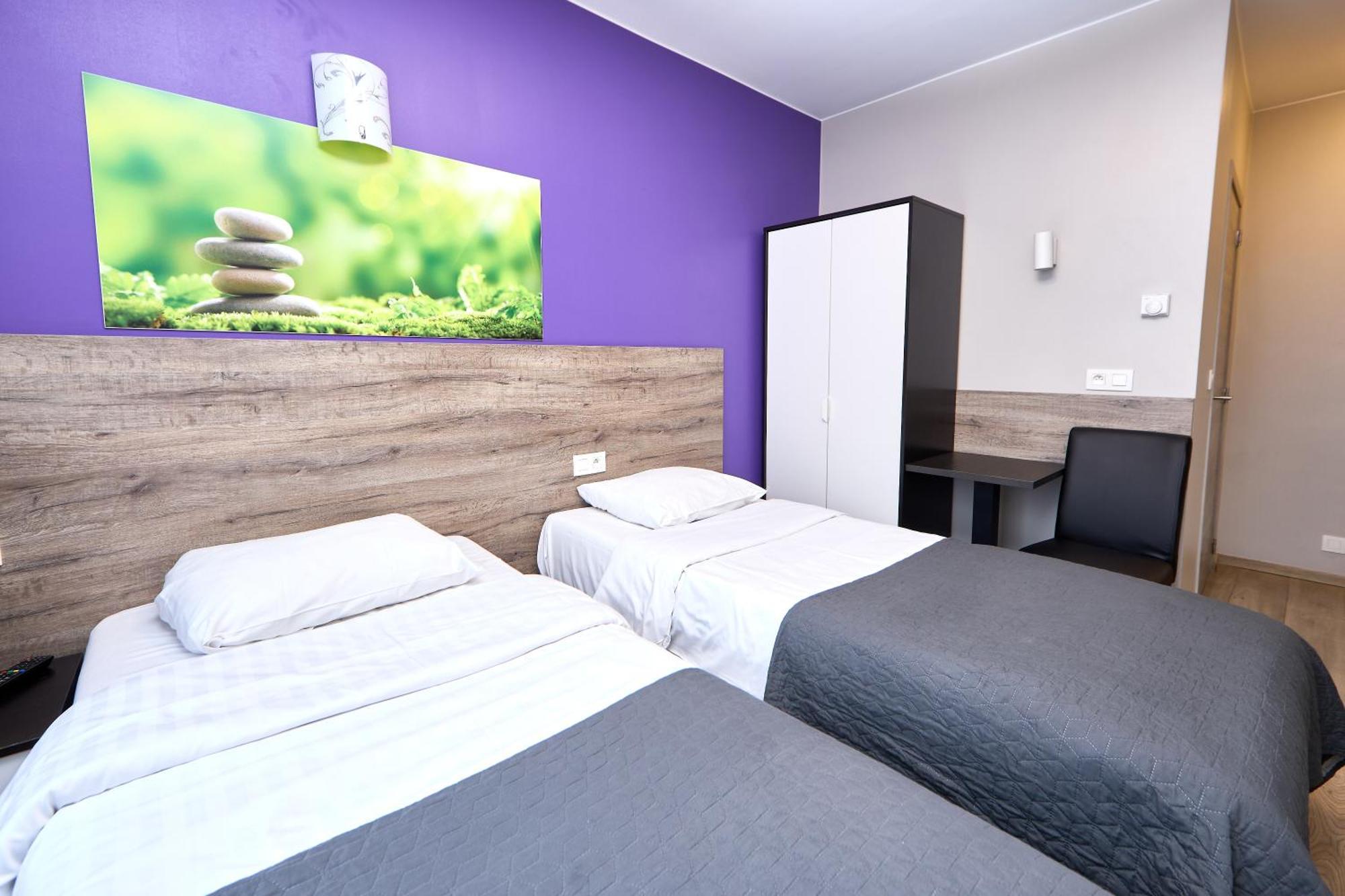 Tweepersoonskamer met 2 Aparte Bedden