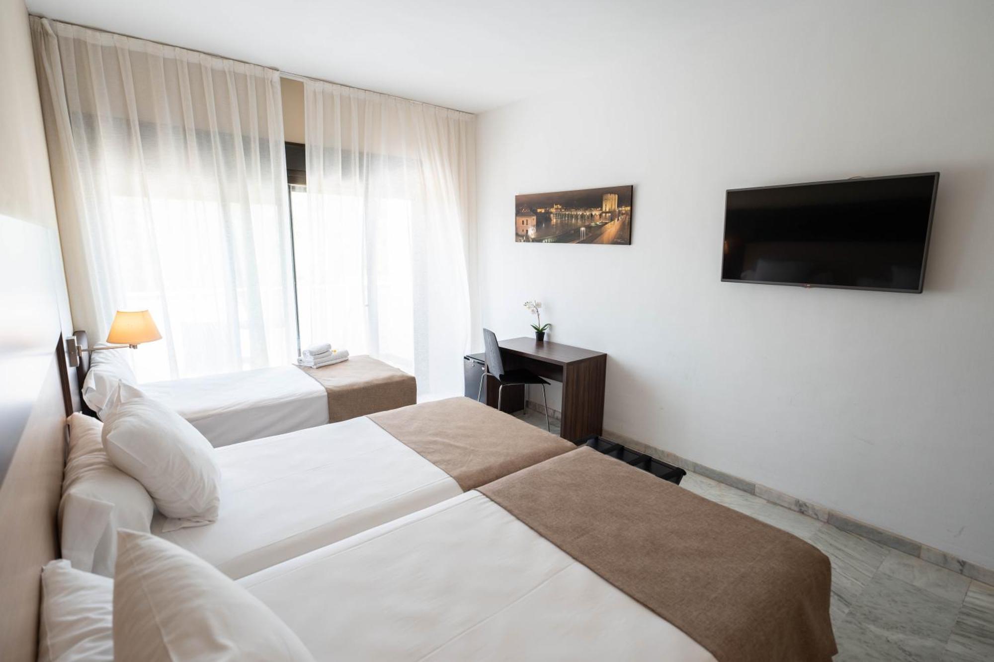 Habitación Doble con cama supletoria (3 adultos)