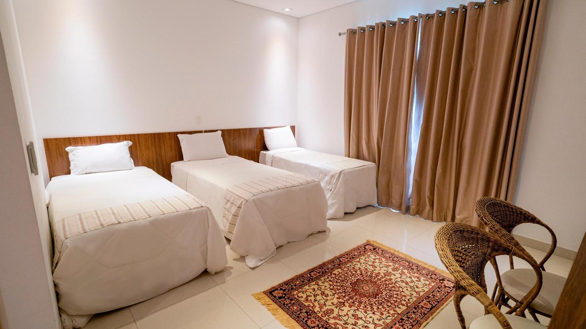 Quarto Deluxe com Cama de Casal ou 2 de Solteiro e Varanda