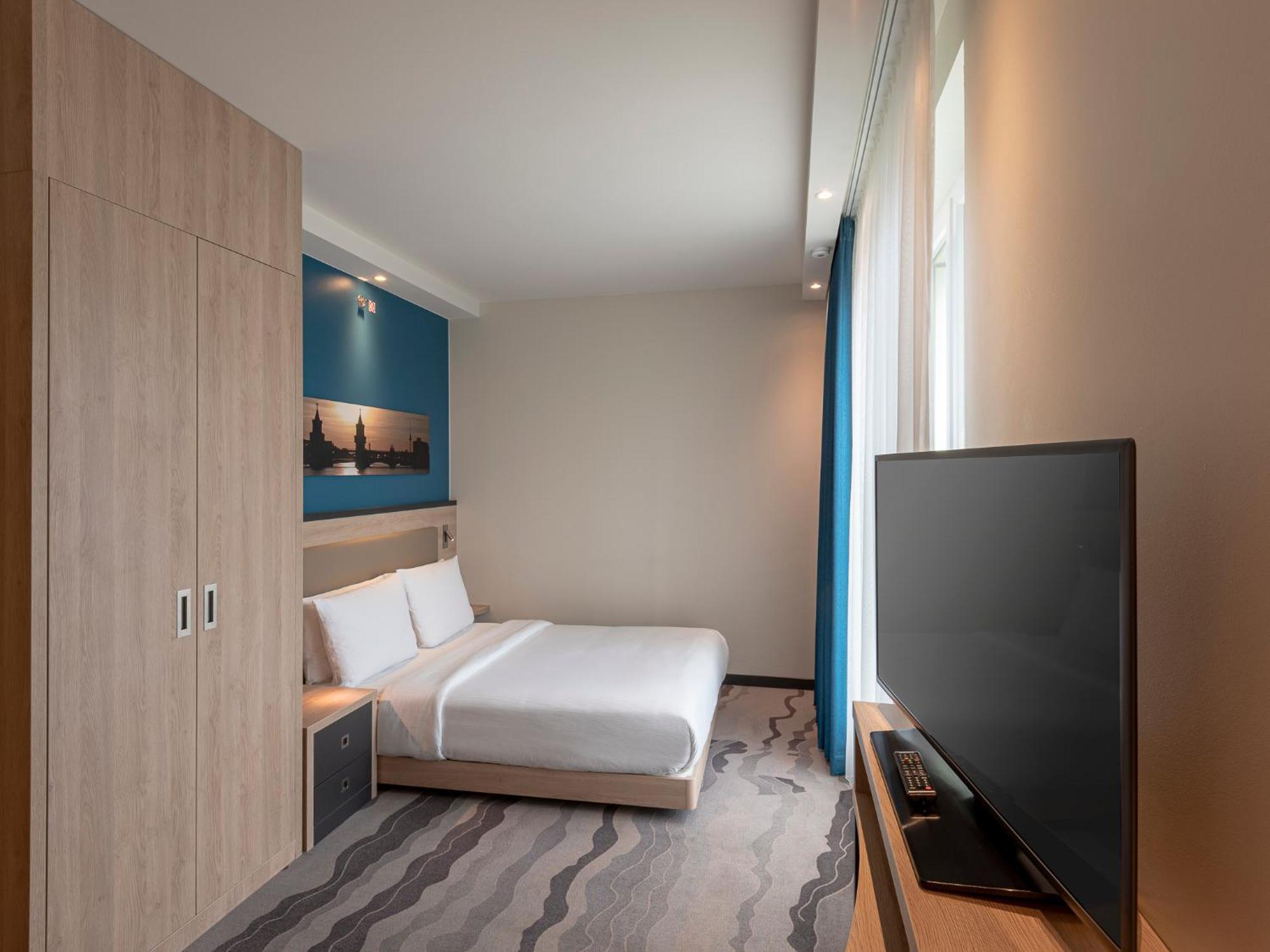 Kamer met Queensize Bed - Geschikt voor Gasten met een Lichamelijke Beperking