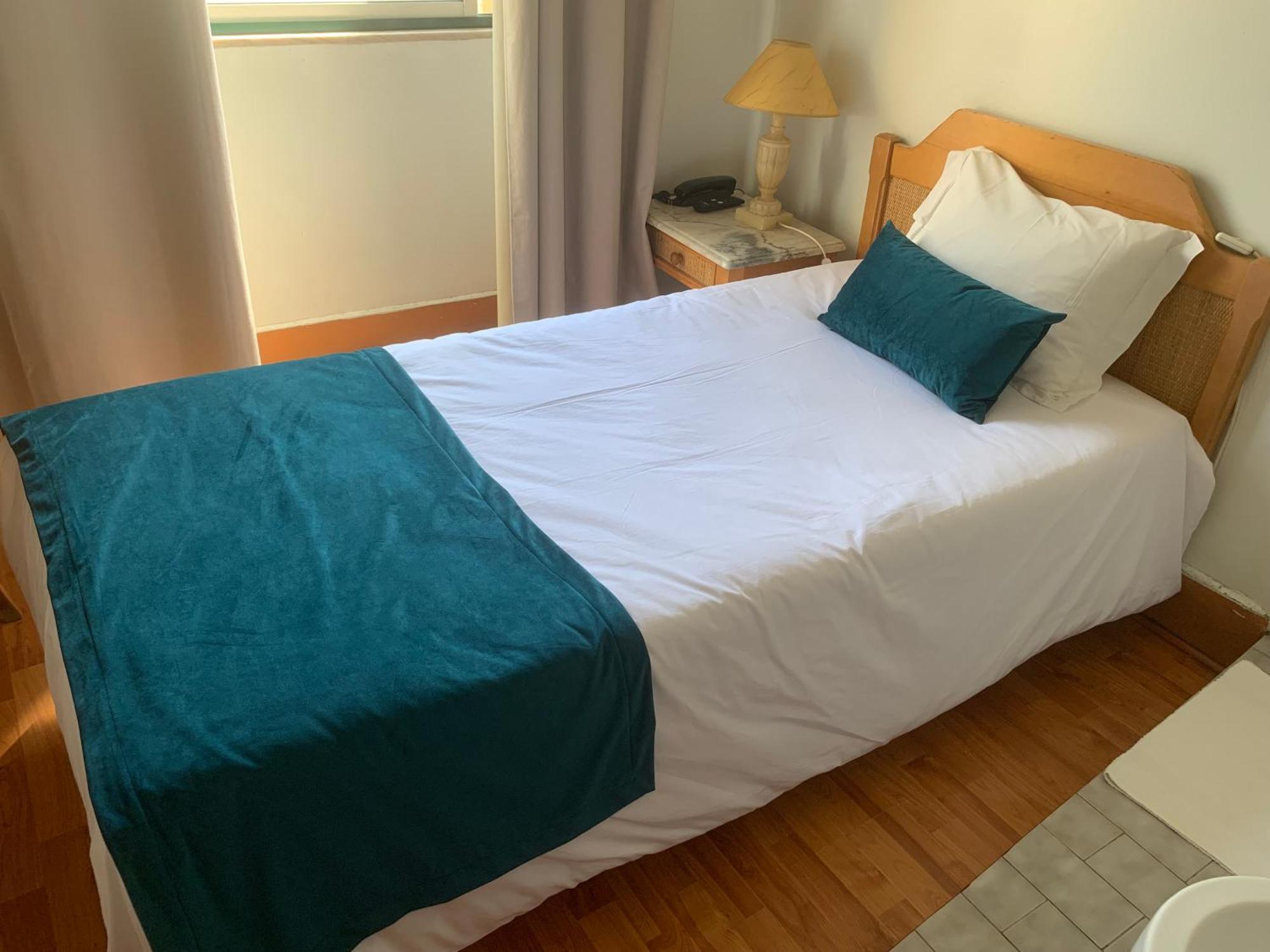 Eenpersoonskamer met Gedeelde Badkamer
