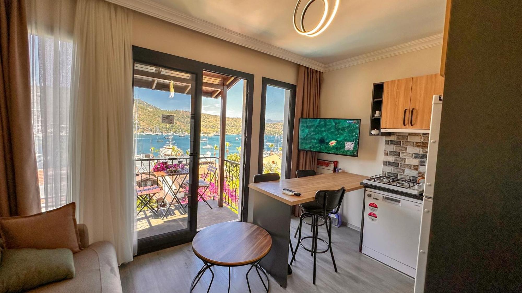 Suite met Queensize Bed en Uitzicht op Zee