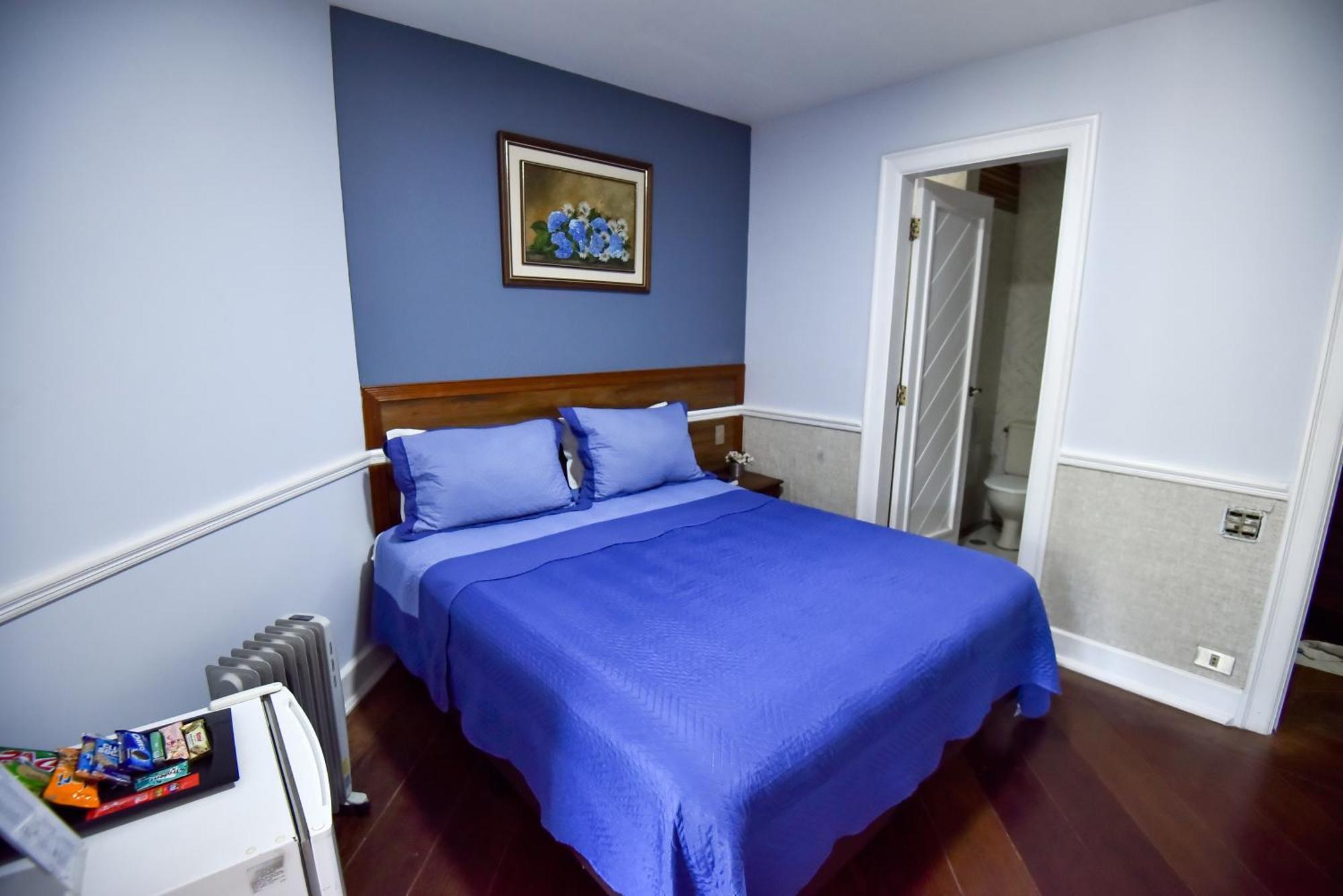 Quarto com Cama Queen-size