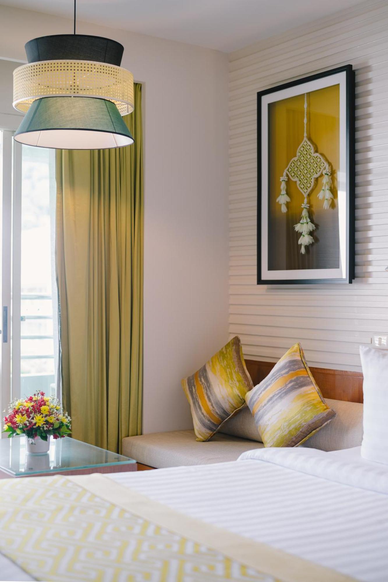 Deluxe Kamer met 1 Queensize Bed en 1 Eenpersoonsbed - Royal Wing