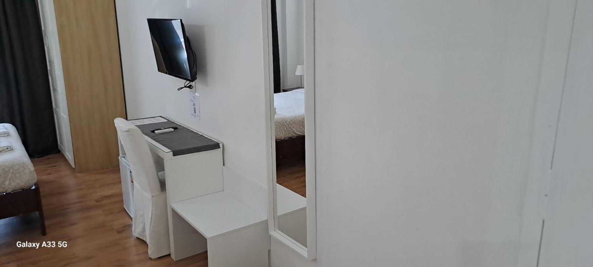 Quarto Quádruplo com Casa de Banho Privativa