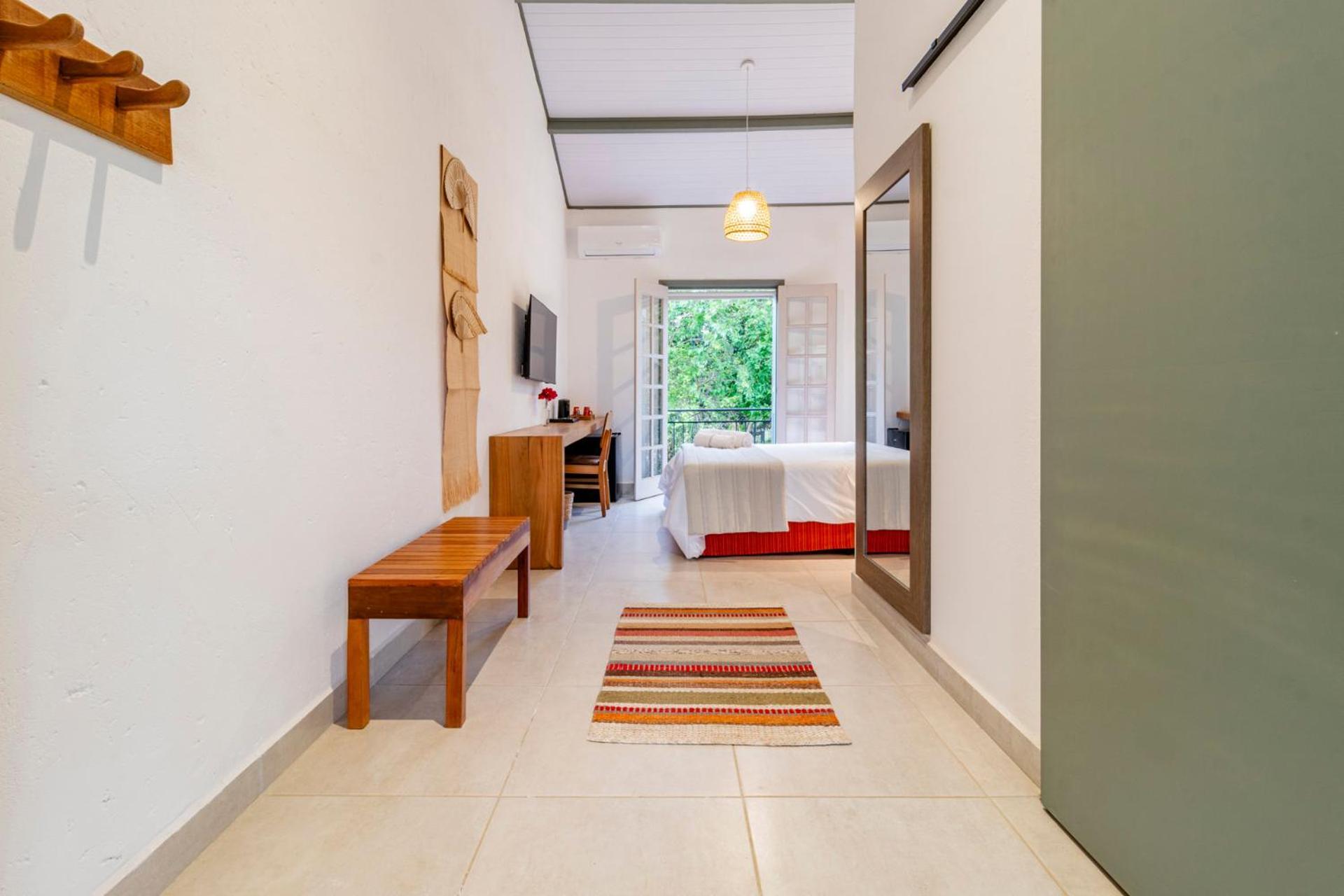 Quarto com Cama Queen-Size e Varanda